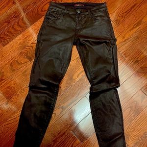 Burgundy coated skinny jeans